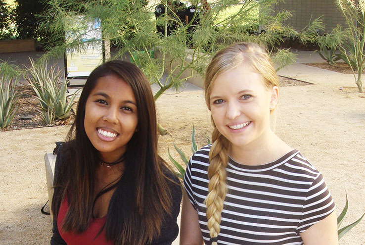 Two girls smiling